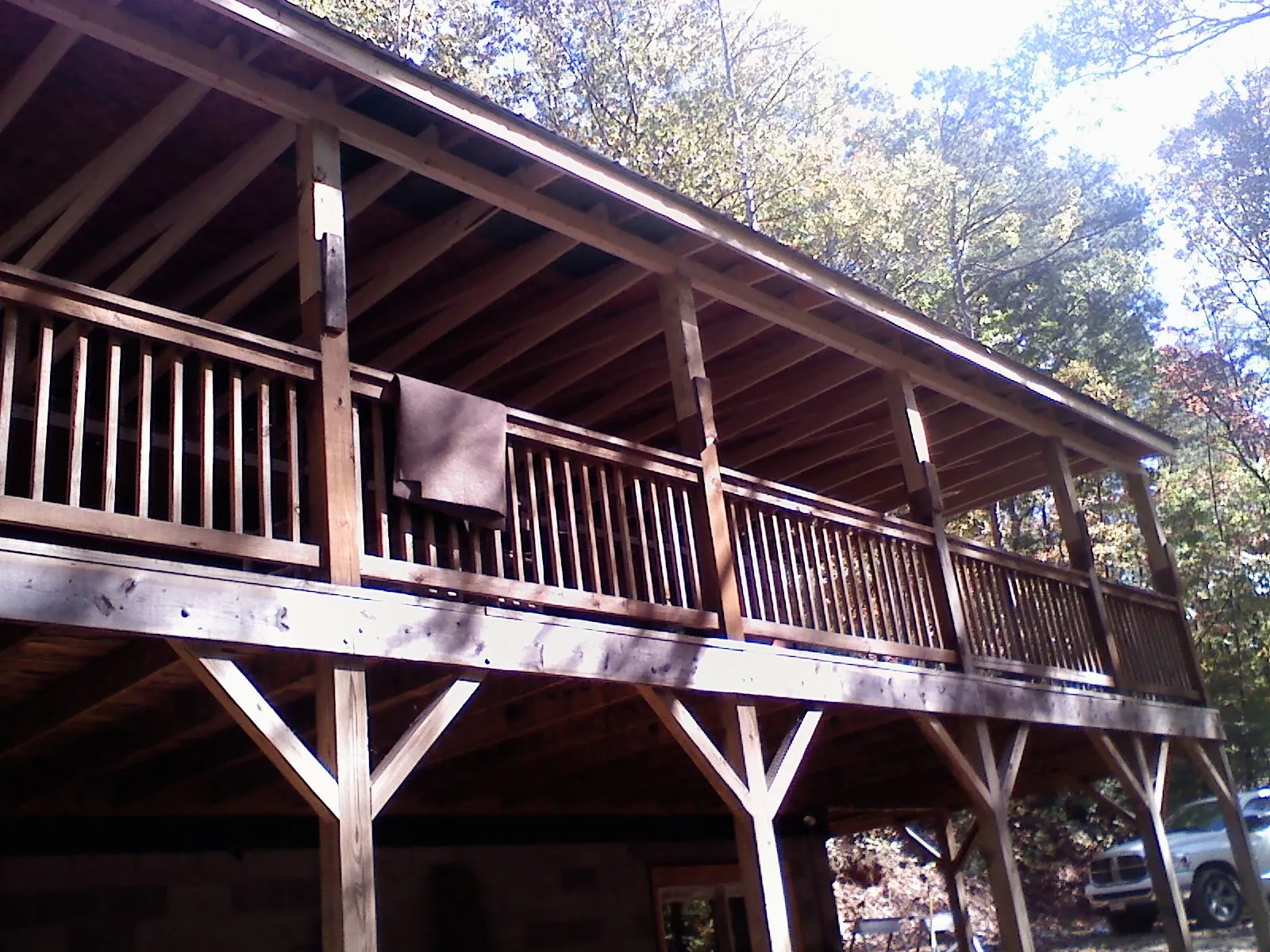 Timber framing under a new elevated porch and deck — Roof Leak Repair in Modena by Roofing Brothers